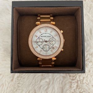 Authentic Michael Kors rose gold watch retail$250